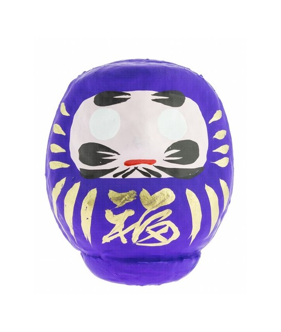 Daruma es el monje que llevó el budismo a China y también tiene muchas caras. Esta es una de sus caras mas populares: en Japón 
