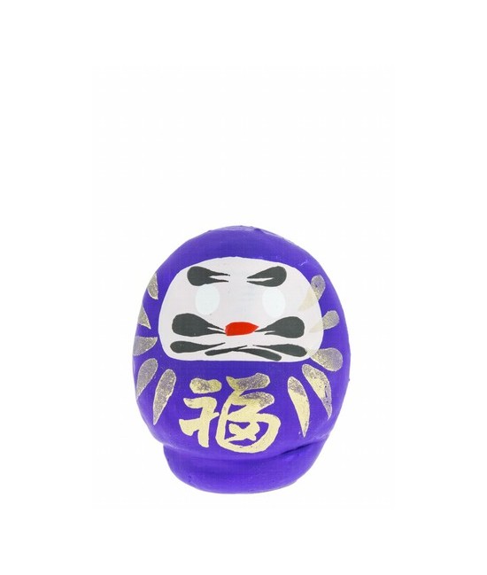 Daruma es el monje que llevó el budismo a China y también tiene muchas caras. Esta es una de sus caras mas populares: en Japón 