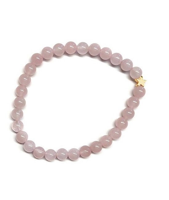 Pulsera de Cuarzo Rosa (bolas de 6mm) con símbolo de estrella dorada.

En goma elástica.

Tarjeta exclusiva en 3 idiomas.